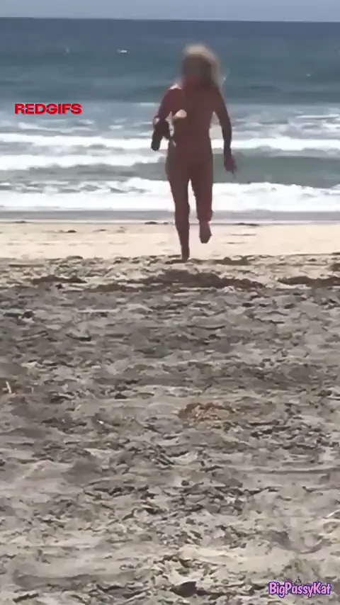 Kathy going wild at Black’s Beach.