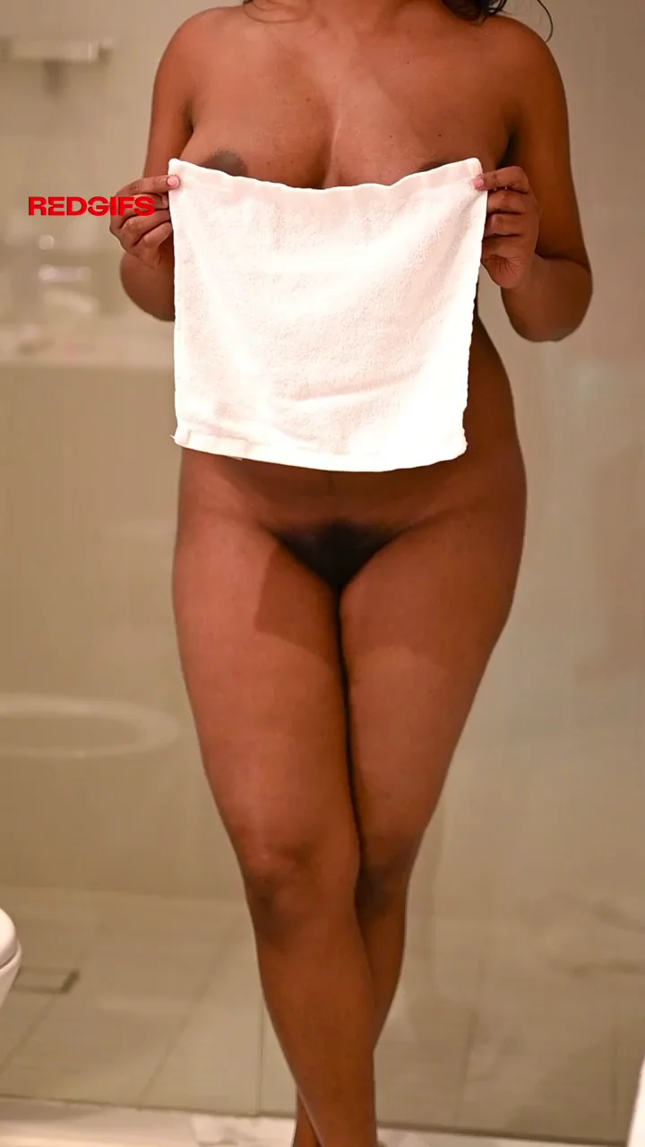 Desi Bombshell Teases with Towel: Massive Tits Dripping Wet