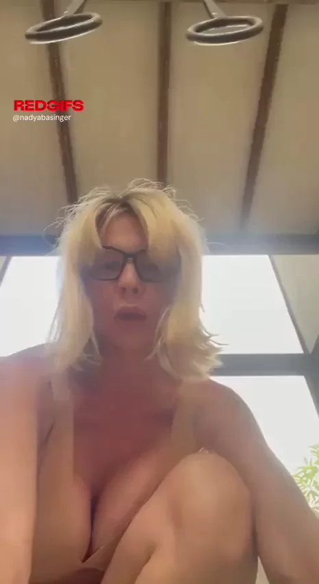 Hairy pussy rides on a swing