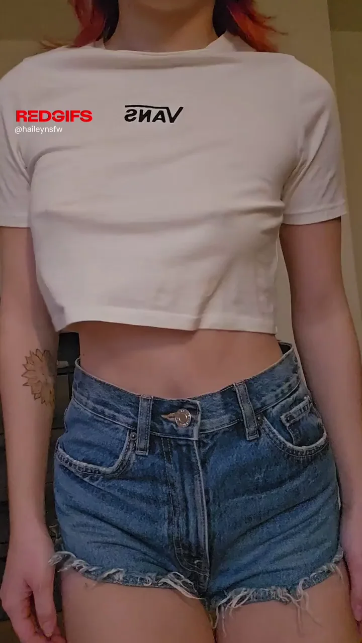 Petite Redhead Tease Unveils Pierced Perky Tits in Tight Jeans
