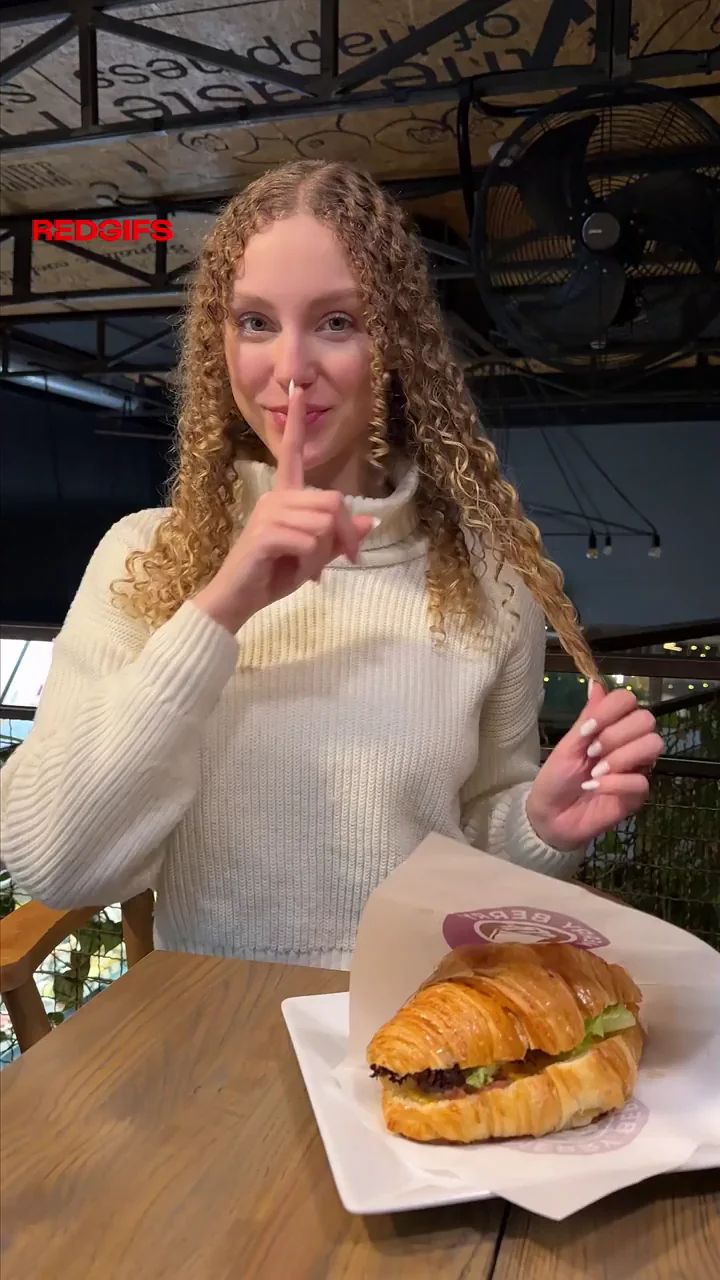 Curly blonde in the cafe