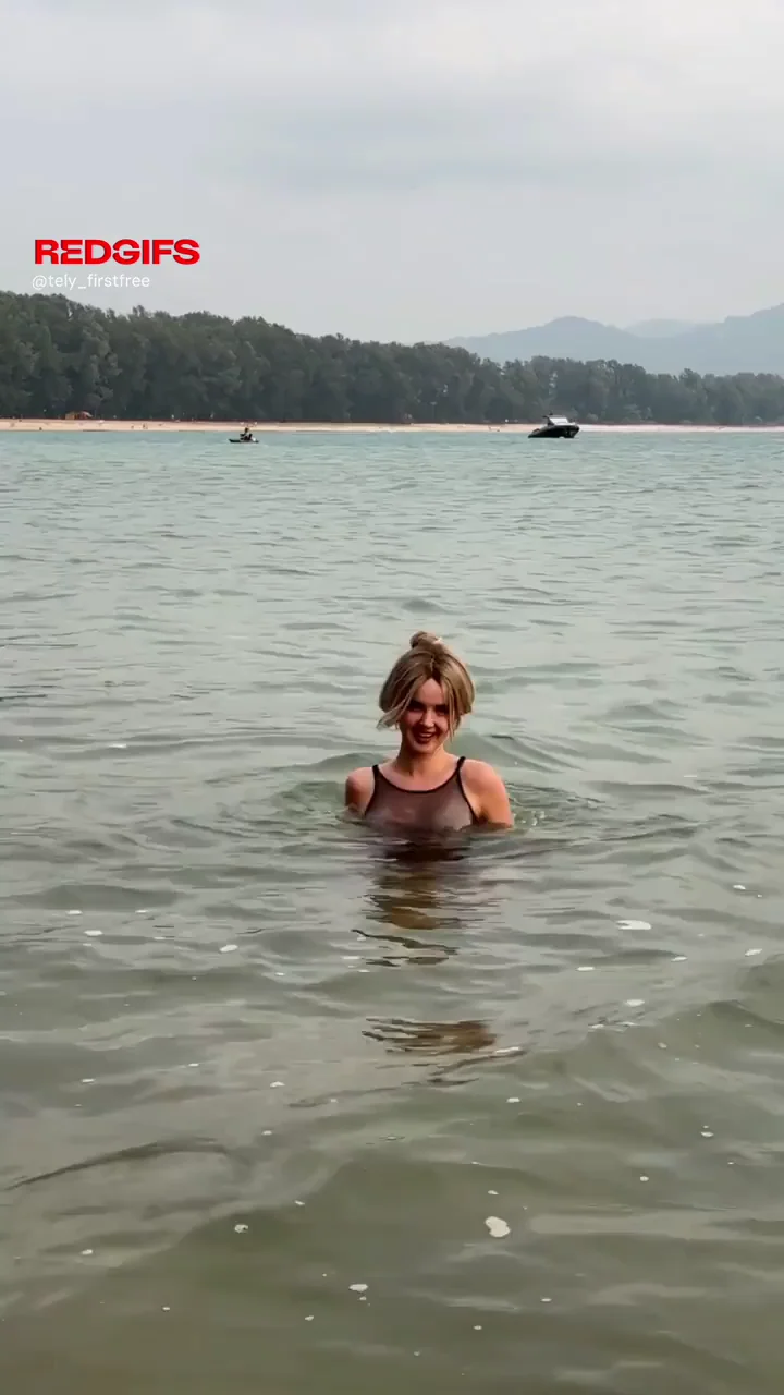 Blonde Babe's Sheer Swimsuit Tease in Public Waters