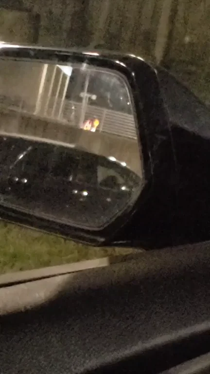 In the parking lot of a juvenile jail