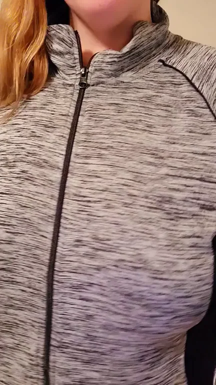 G-Cup Busty Redhead Leaks Milk Right Through Her Tight Bra and Zip-Up Shirt!