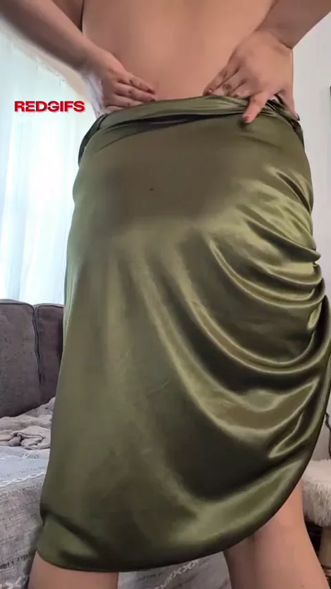 Thick Black MILF Teases with Massive Booty in Shiny Skirt