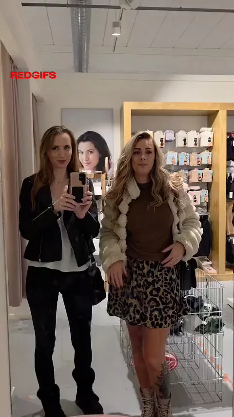 Saggy VS fake tits in a store