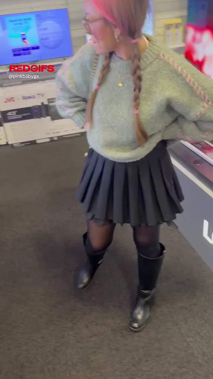 Pigtail Slut Flashes Massive Tits in TV Store Showdown