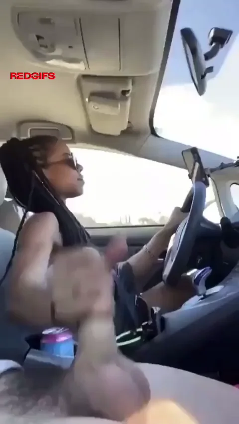 Kira Noir's Roadside Grip: Black Babe Jerks White Dick While Driving
