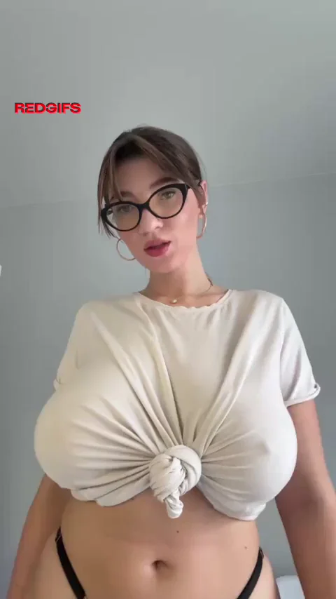 Slutty Glasses Babe Serves Up Her Massive Tits for Your Dreams