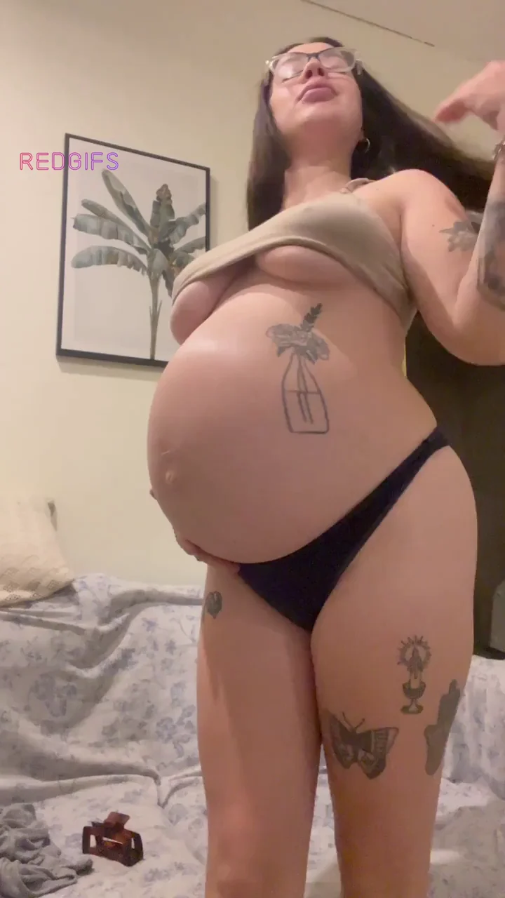Horny Inked Preggo Bombshell Teases Her Massive Belly & Tits