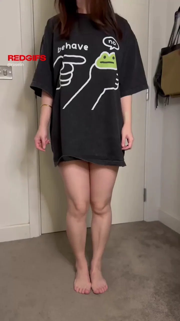 Chinese Cutie's Slutty T-Shirt Tease: Perky Tits Beg for Your Stare