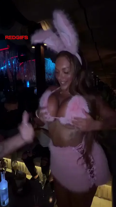 Bunny Busty Bombshell Teases Massive Tits in Pink Fur