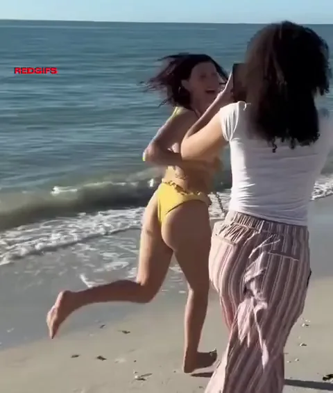 Millie Bobby Brown's Juicy Yellow Thong Beach Ass Bounce 🍑🌊💦