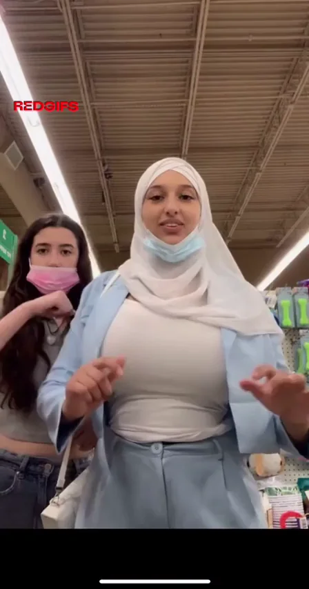 Even modest clothes cant hide those massive tits