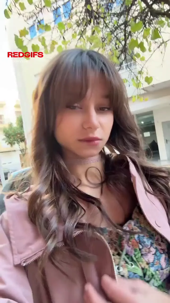 A quick tease while walking down the street