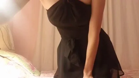 Slipping off my dress. See what's underneath
