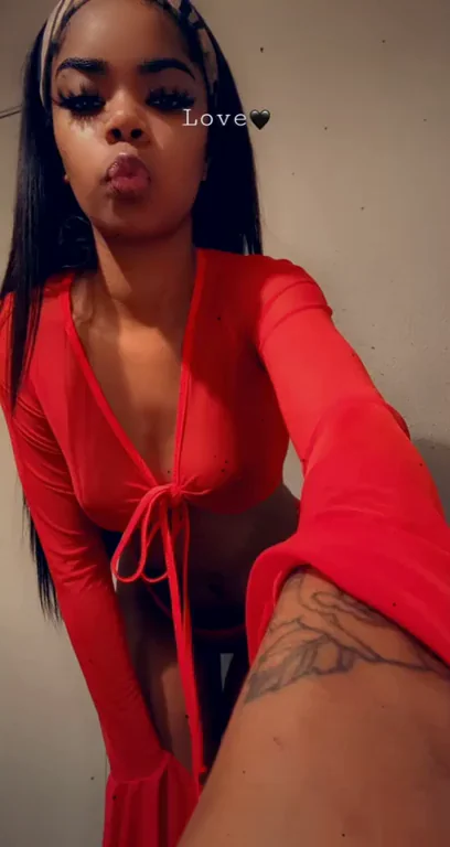 Perky Ebony Tits Tease in Red Mesh