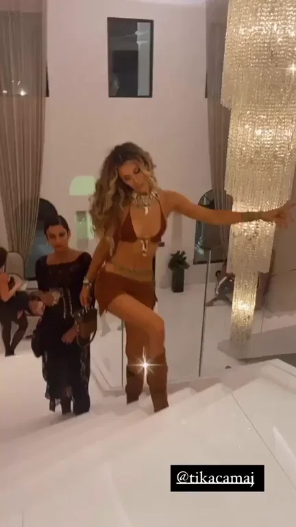 🔥 Tika Camaj's Skinny Tease Walk in Slutty Brown Bikinni 👠🍑