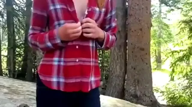 Gingerly Removing Her Clothes In The Woods