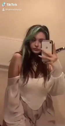 TikTok Tease: Green-Haired Slut's Off-Shoulder Cleavage Flex
