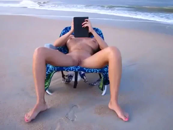 This is how my girl is usually showing at the beach. She reads some good porn and fans her legs. She often tells me to “take a walk” - when I come back she will have several guys sitting around her. (F)