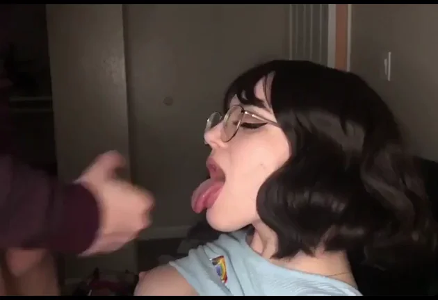 Pretty girl in glasses takes a shot