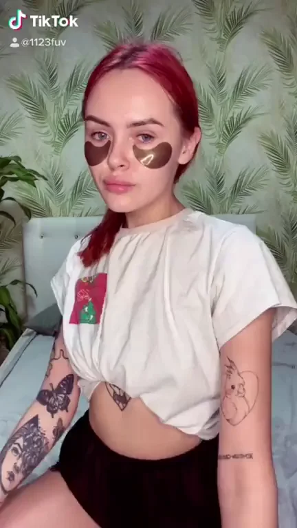 Redhead TikTok Slut Teases Halloween Look with Eye Masks and Tight Shorts