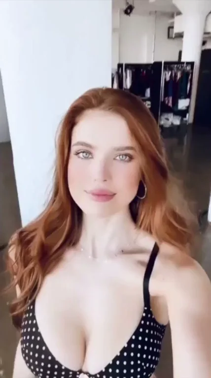 Emily Deyt-Aysage's Sultry Redhead Tease in Polka-Dot Cleavage