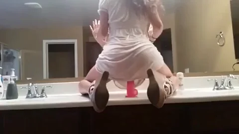 White Dress On A Suction Dildo