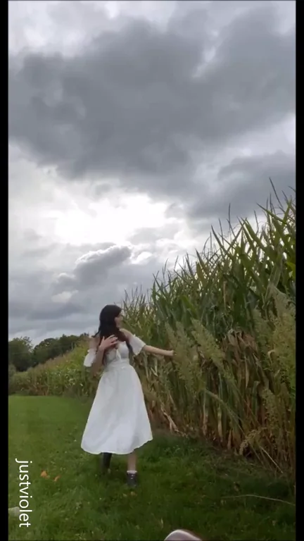 naughty farm girl playing with corn on the cob