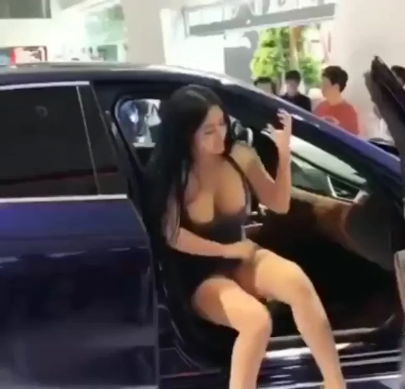 Vietnamese Model Nipple Tease at Vietnam Car Show - GIF