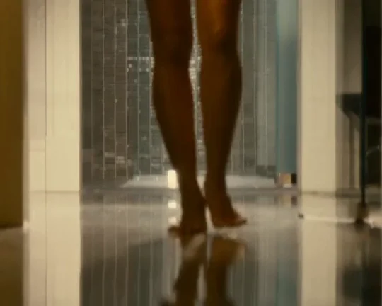 Rosario Dawson's Sultry Barefoot Tease in Sheer Shadows