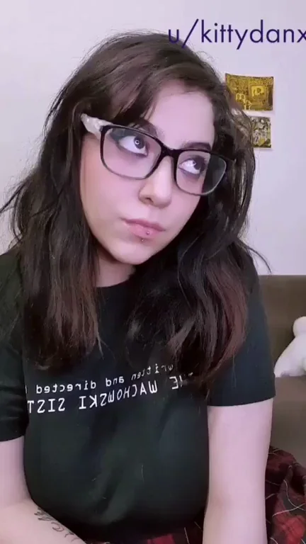 Nerdy Glasses Babe Teases Her Massive Tits in Harness