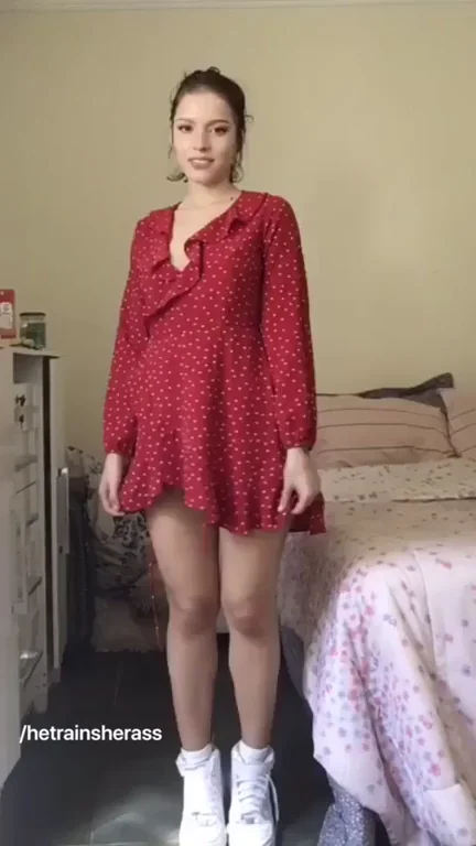 Surprise Tease: Red Dress Drops to Bare Tits and Thong