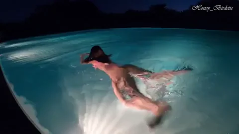 Hot tourist swimming and flashing