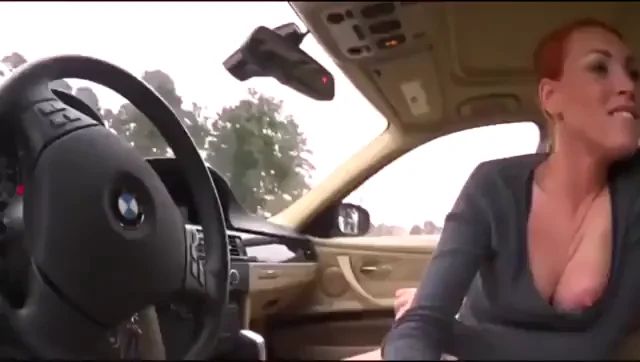 Redhead Cutie Gives Head in Taxi