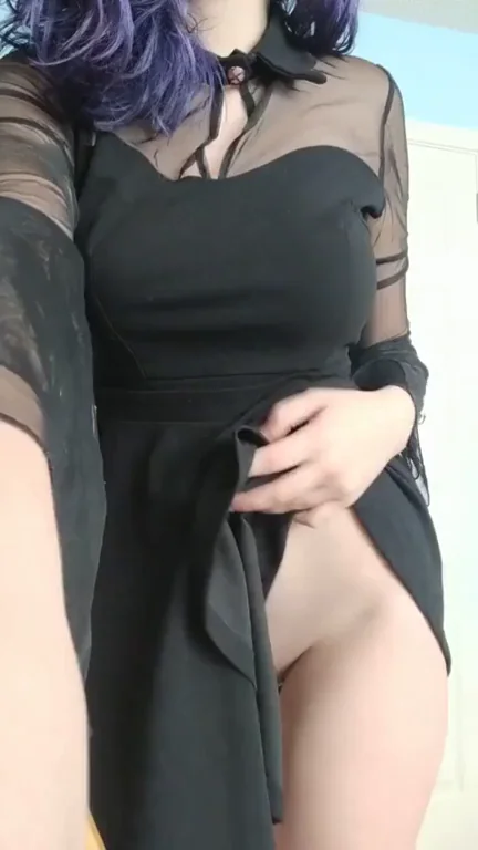 Purple-Haired Slut Lifts Dress and Flashes Her Juicy Tummy