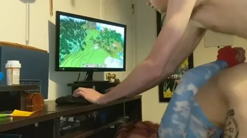 Fucking her while playing minecraft