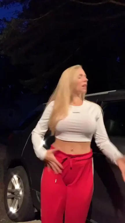 Blonde Bombshell Flexes Her Bolted-On Tits by the Car 🔥🍒
