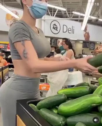 Eyes on the Prize: Masked Babe's Cucumber Tease in the Deli