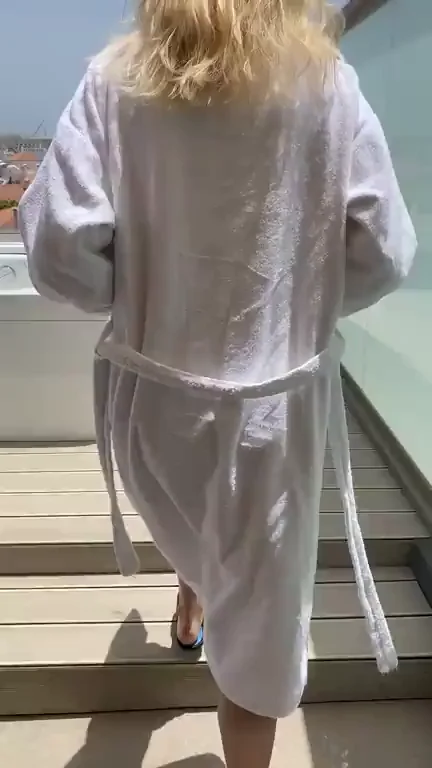 Blonde Babe's Risky Balcony Flash 👀🩲💦 [GIF]