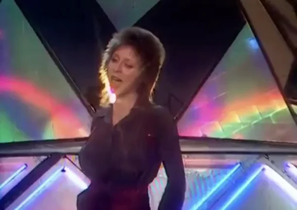 Leslie Maria Knauer lead singer who was in a short lived pop band along with her 2 brothers called Promises back in the late 70’s.