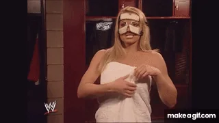 Trish Stratus (2004) dropping her towel