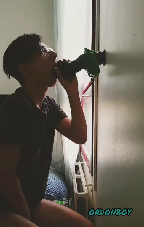 Bad Dragon Deepthroat: Twink Slurps Massive Green Toy Against the Wall