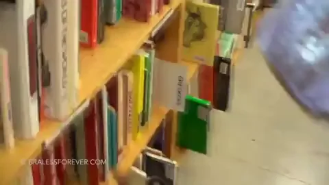 Blonde Slut Flashes Tits in Public Library
