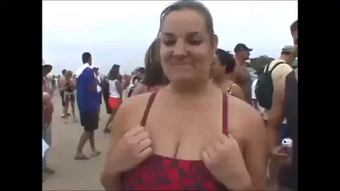 Shy Beach MILF Drops Bikini Bombshell: Massive Tits Spill Out on Spring Break