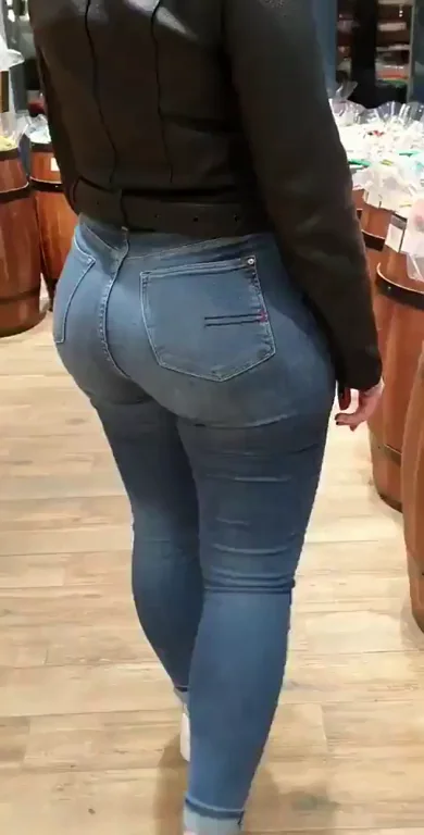 🍑 Mystery Babe's Jeans-Clad Phat Ass in Candy Shop! Who TF Is She? 🔥