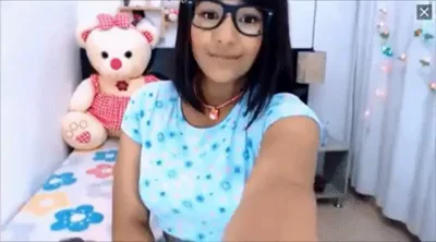 Horny 18-year Old Latina with Glasses and Braces Shows Off Her Strong Legs