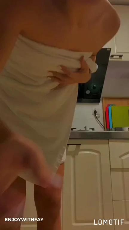 Behind the towel