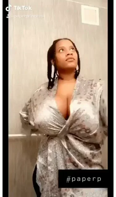💥 Massive Tits Barely Hidden in Shiny Robe 😍
